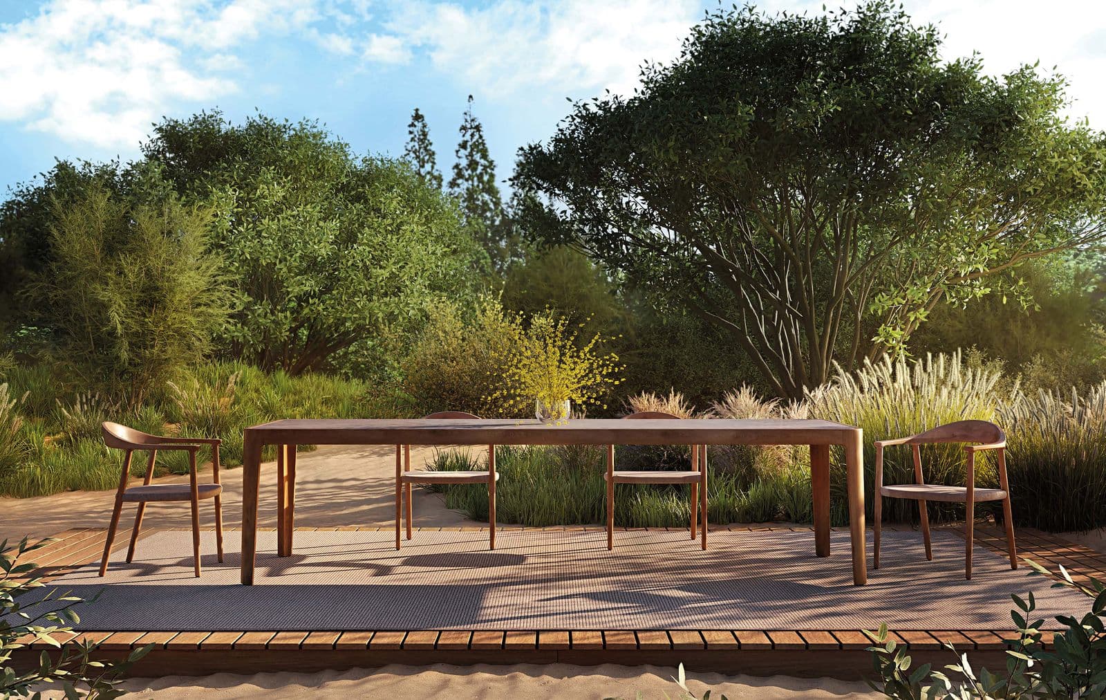 Naxos arm chairs with the Positano dining table under a pergola.