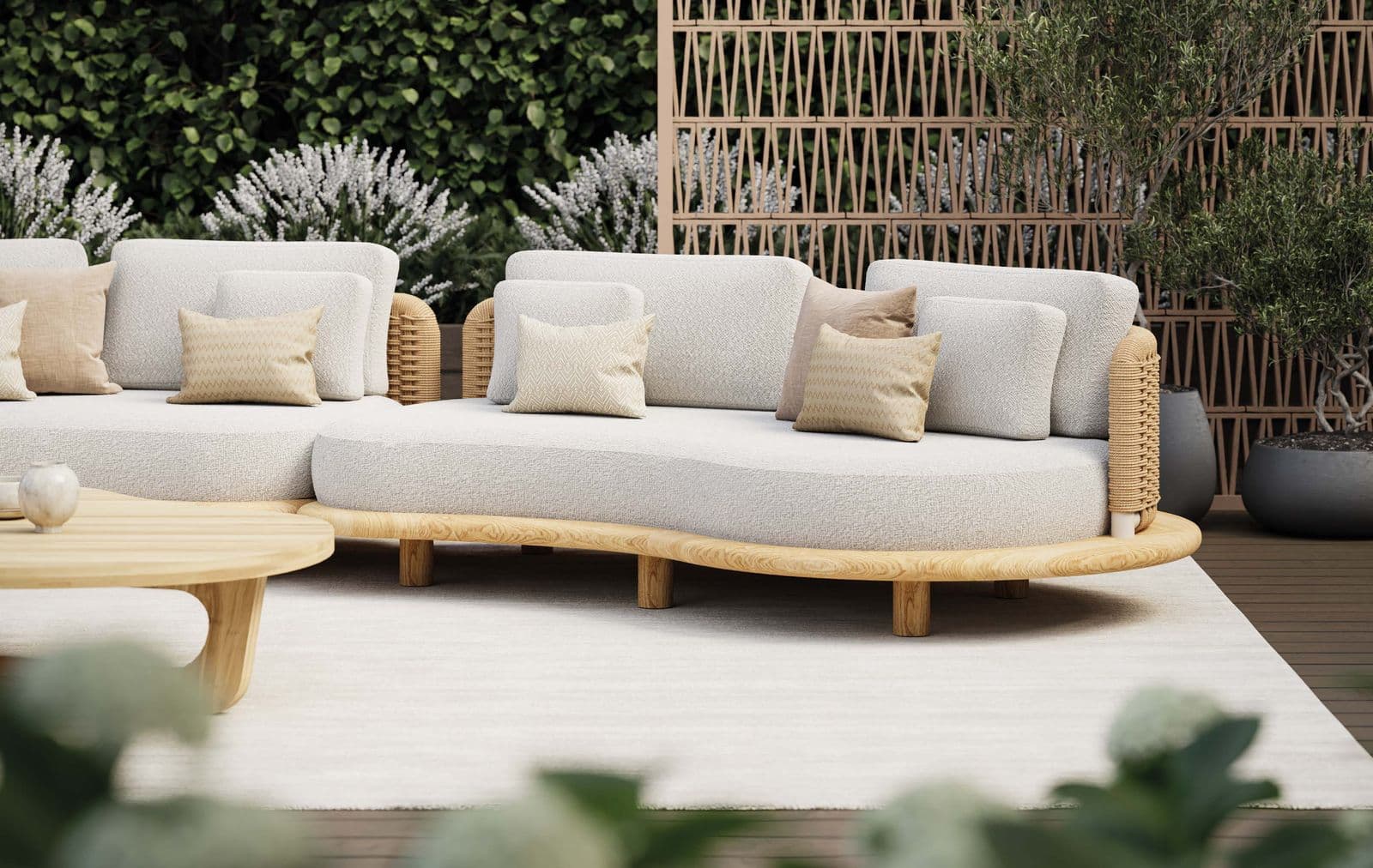 Orosei organic lounge with light grey cushions and Brindisi organic lounge table.