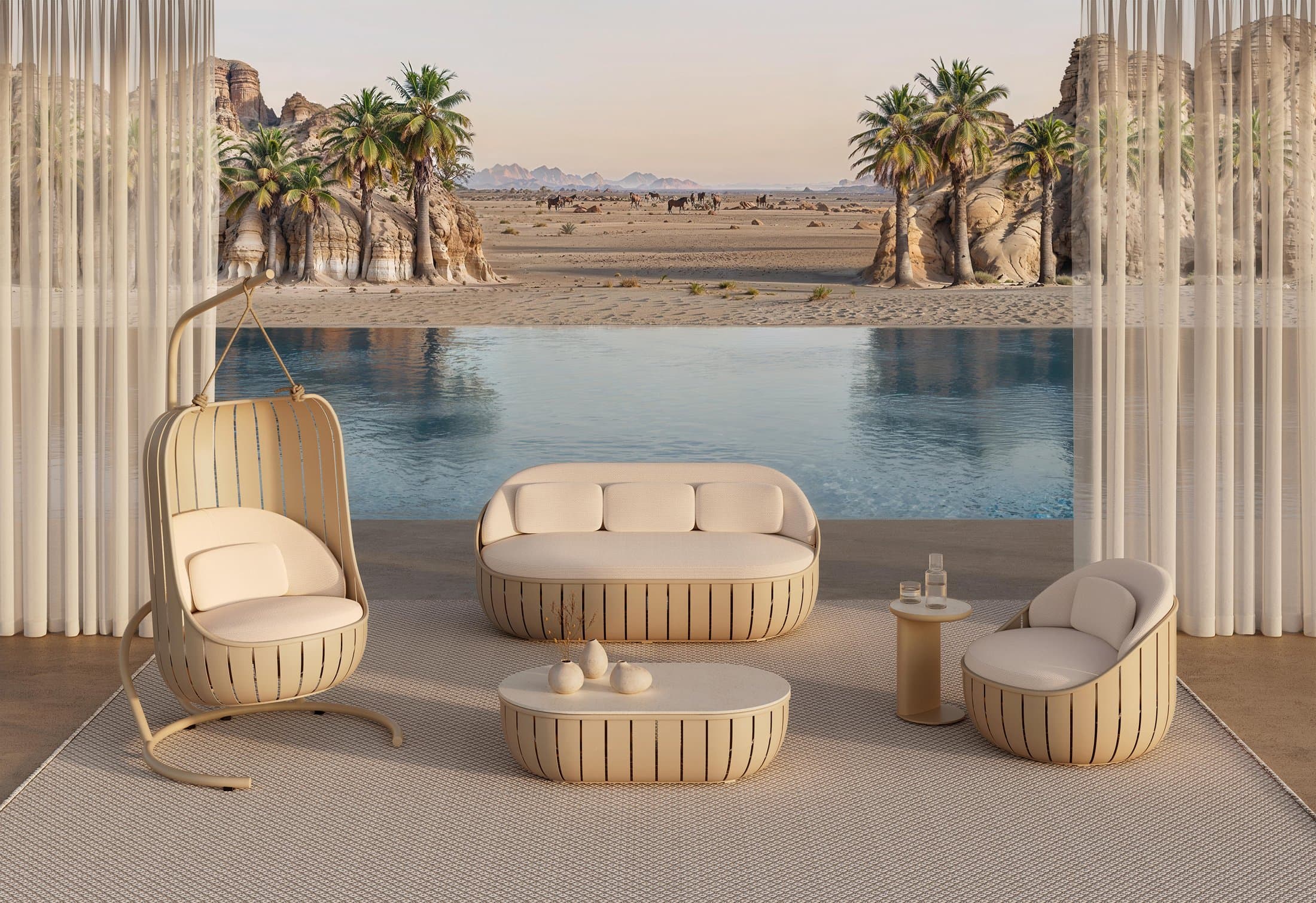 Arena woven sofa, lounge chair and hanging swing in sand at a desert pool.