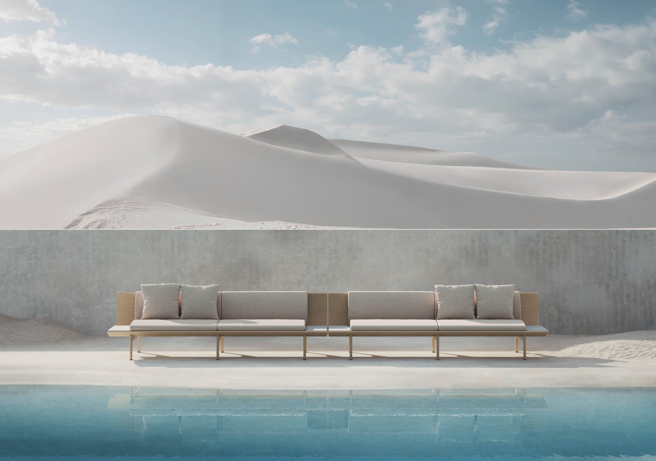Dunne 3-seat sofas with tables in gold at a pool edge.