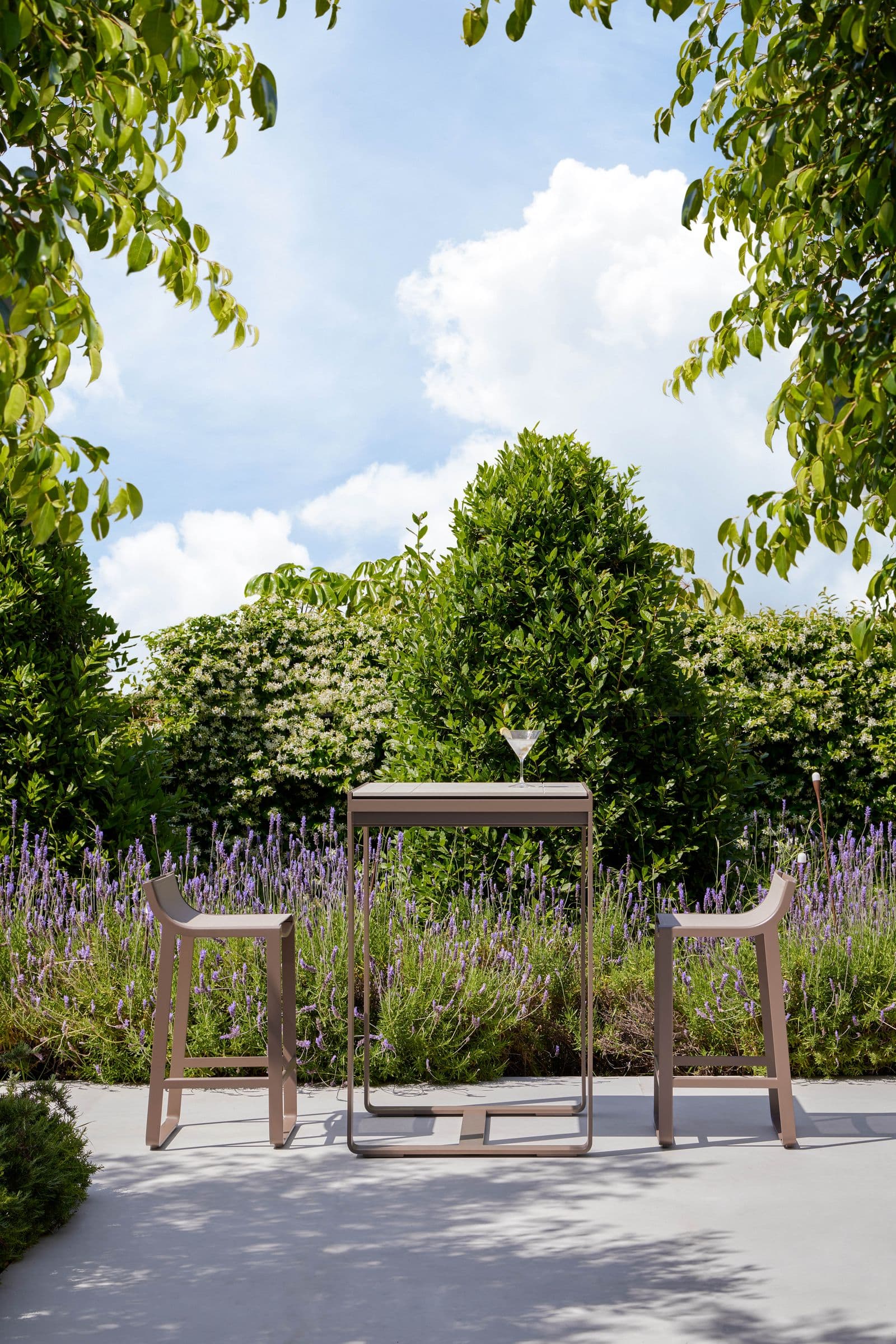 Flat bar table 70 in bronze.