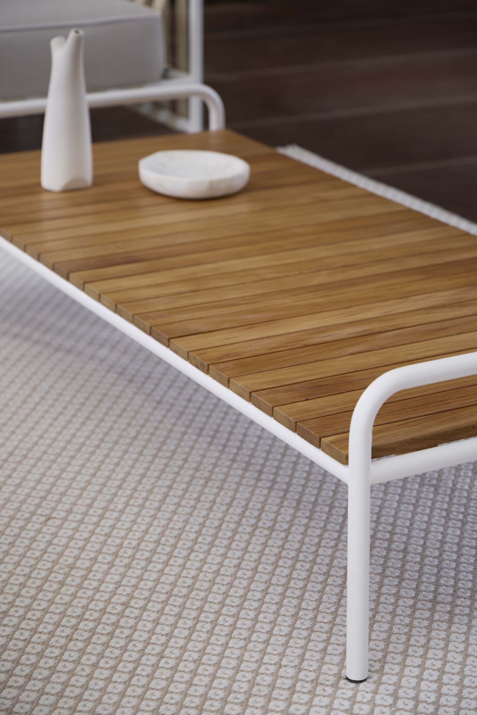 Onsen coffee table 153, white frame with iroko top.
