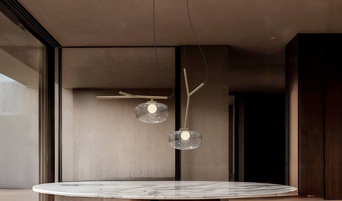 Talea suspension over a marble dining table.