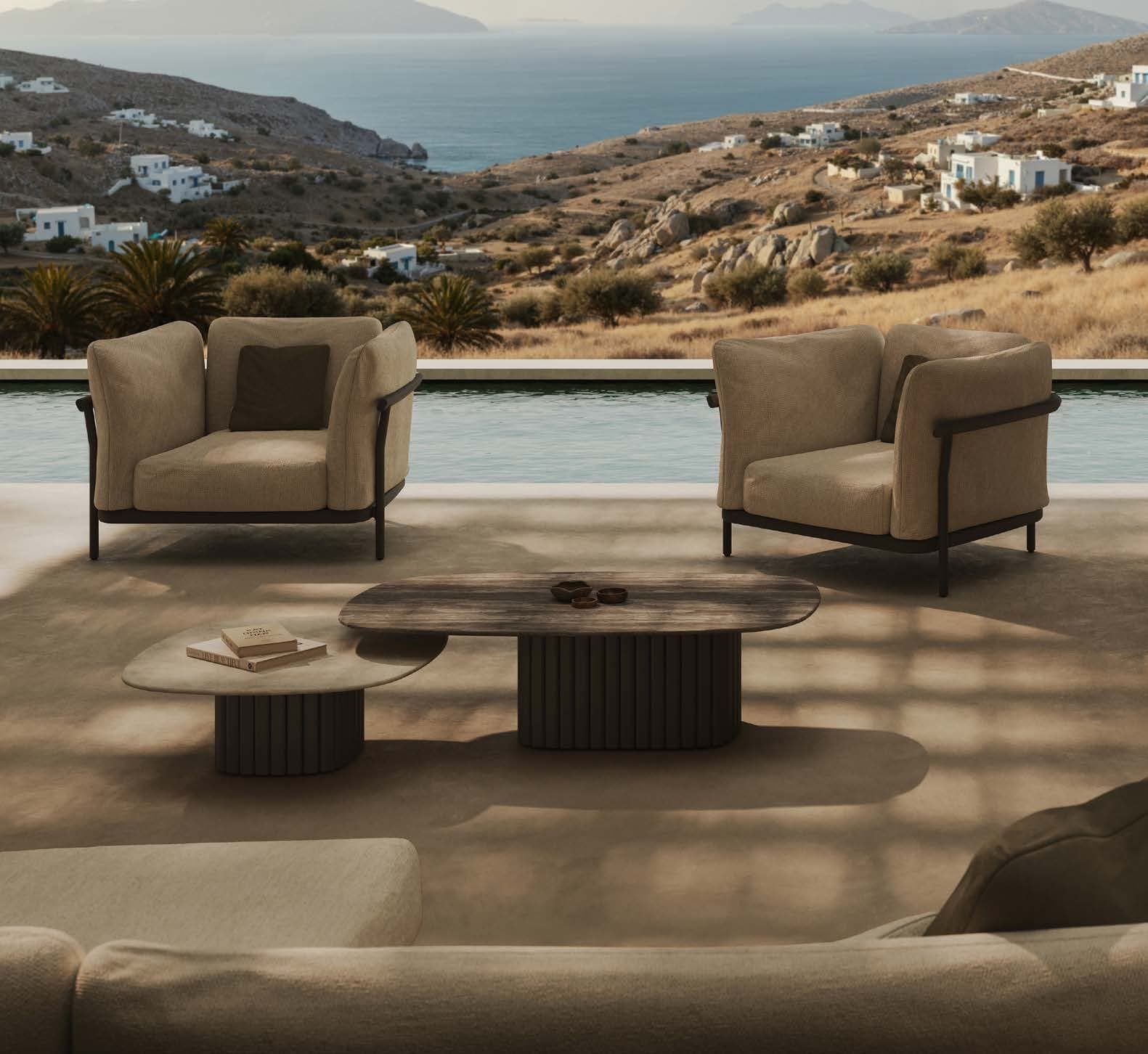 Nami lounge chair and coffee tables overlooking the sea.