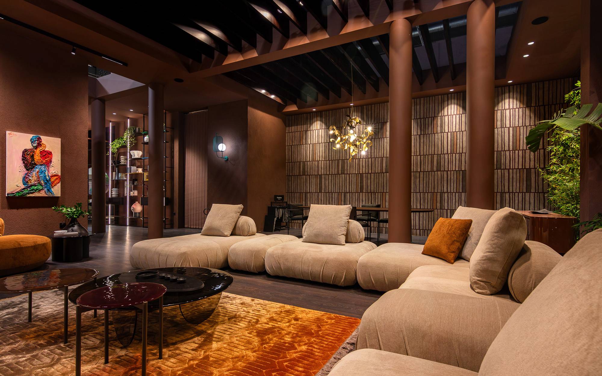 Papadatos Arenal sofa in a warm, terracotta-toned lounge interior.